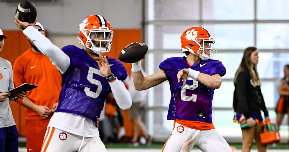 Uiagalelei (5) and Klubnik (2) throw during practice this week.