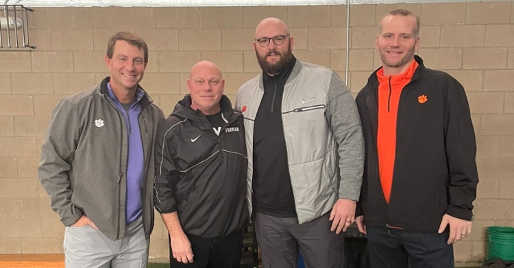 Clemson coaches pose for a picture at storied Permian Monday.