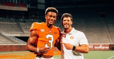 Noble Johnson poses with Tyler Grisham on his visit. 