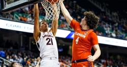 Cavaliers send Tigers home with smothering performance, Clemson awaits NCAAs fate